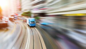 Traffic on the move at hong kong city street.